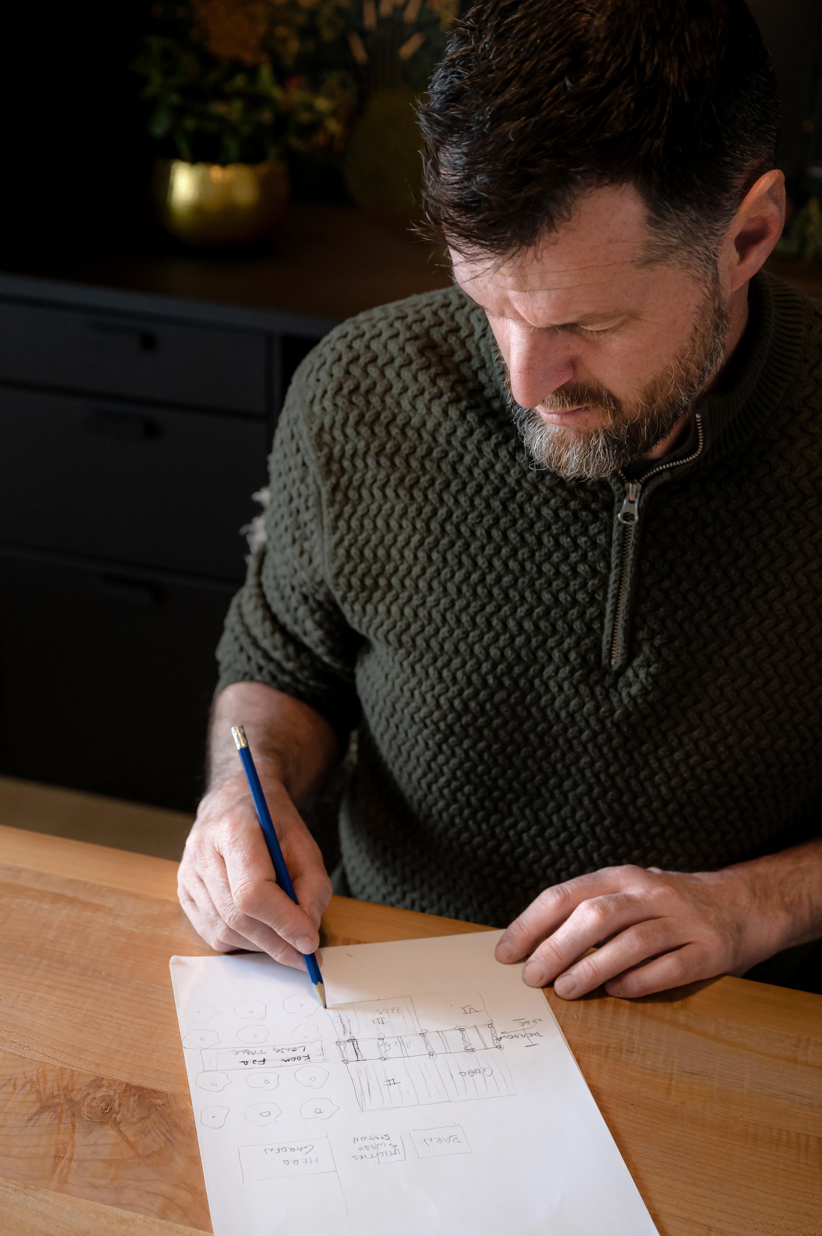 Close-up image of Jack as he draws a design.